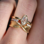 0.57ct Marquise Diamond Abstract Bezel Ring on hand