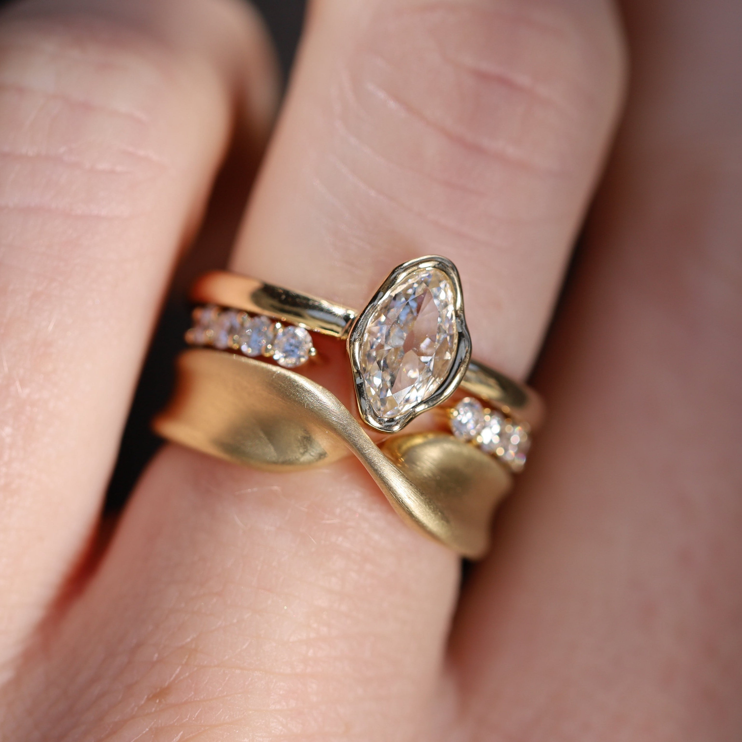 0.57ct Marquise Diamond Abstract Bezel Ring on hand