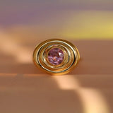 Flat lay of 1.50ct Pink Sapphire In-Orbit Ring