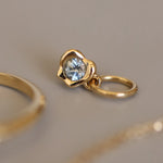 Abstract Bezel Charm flat lay