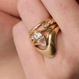 The Colette Marquise Split Shank Engagement Ring close up on hand