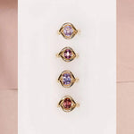 Flat lay of Marrow x Sammi colored gemstone Florence rings