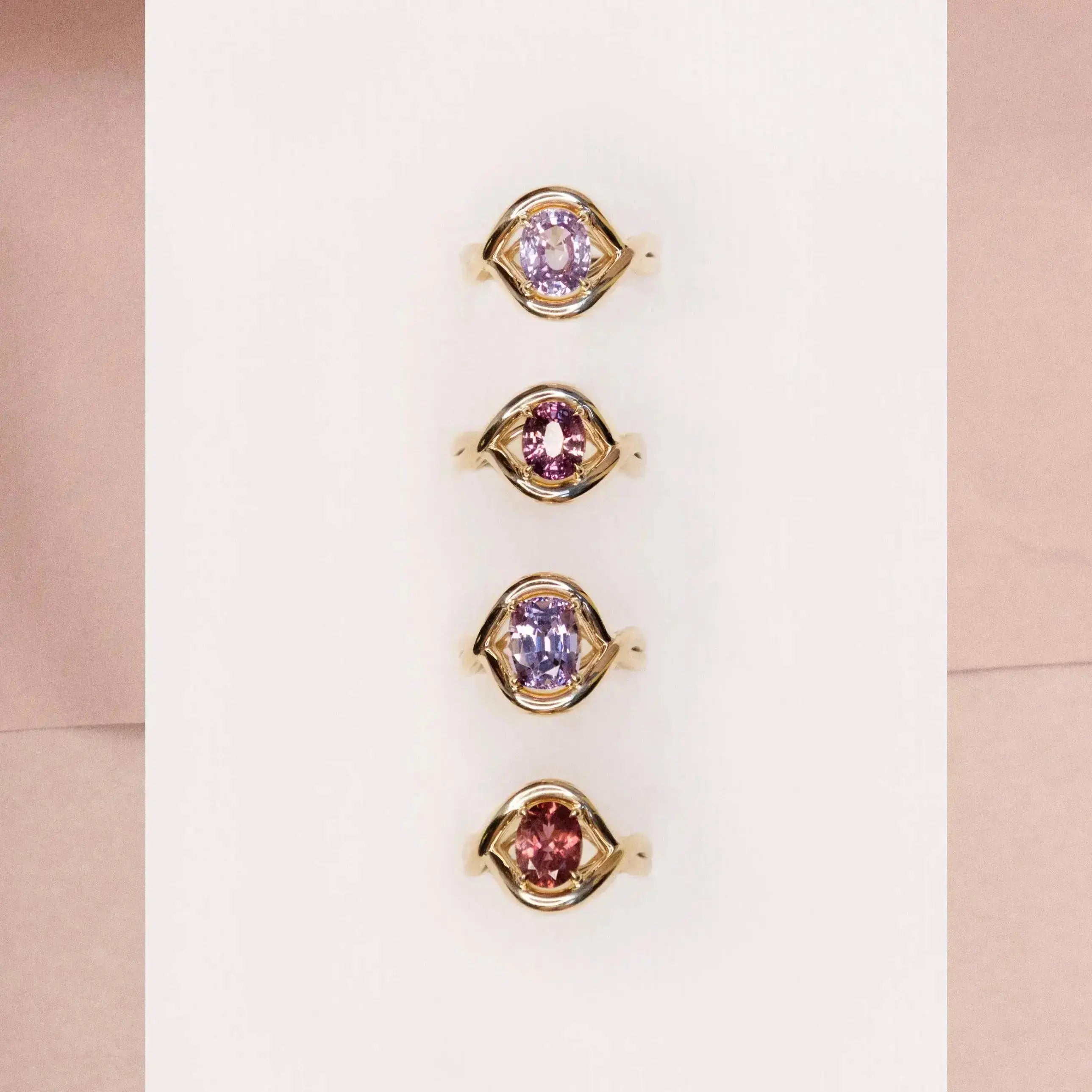 Flat lay of Marrow x Sammi colored gemstone Florence rings