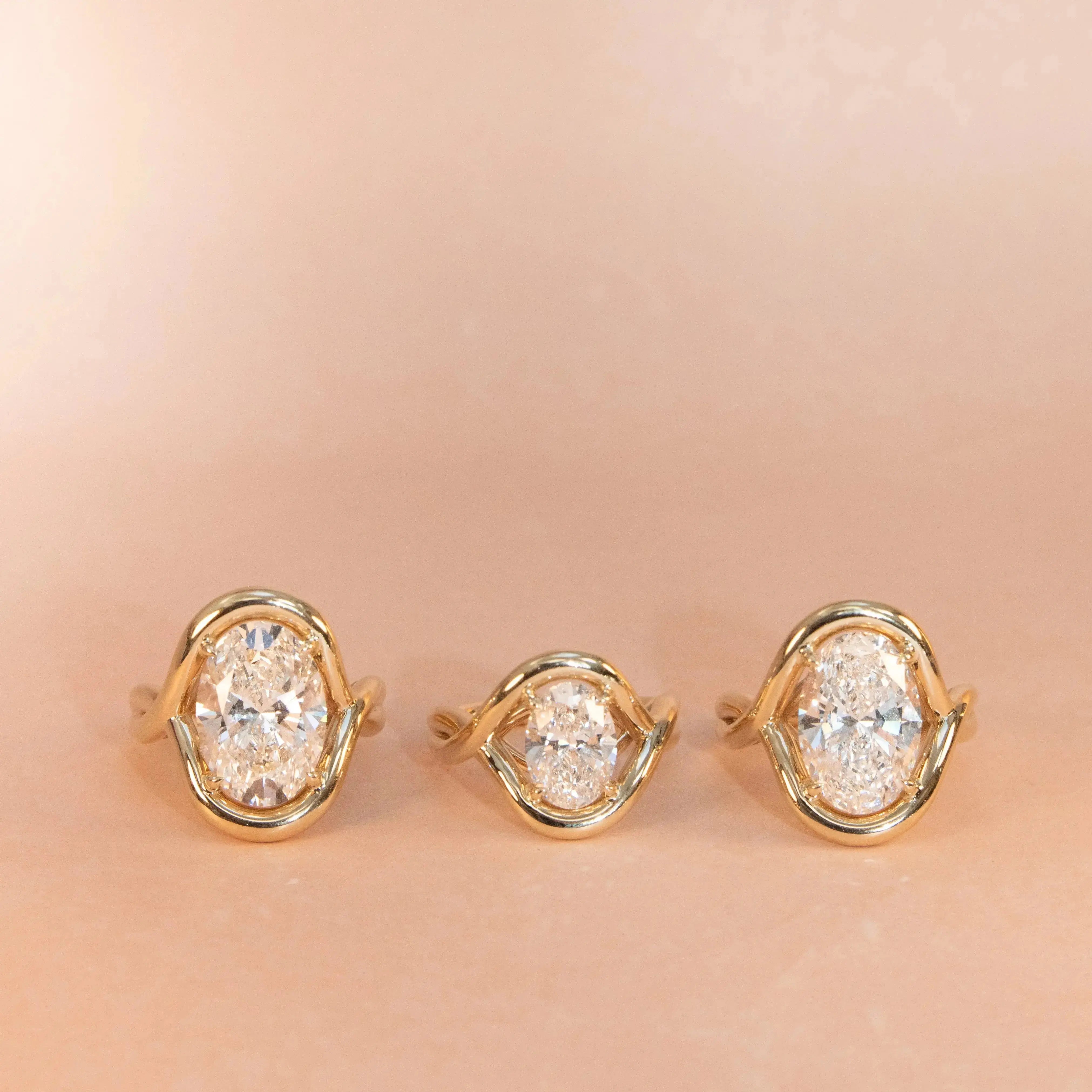 flat lay of 3 Marrow x Sammi Florence Rings featuring lab-grown diamonds in different carat weights