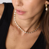 Close up of woman wearing Lisse Tennis Necklace