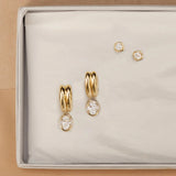 Odette Oval Drop Earrings and Nina Cushion Studs flat lay