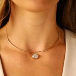 Close up of Odette Oval Collar on woman's décolletage