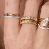 Blue Sapphire Sweet Pea Stacking Ring on hand, close up