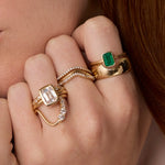 Close up of woman resting hands against chin featuring multiple Marrow Fine rings