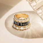 Flat lay stack of Til Death Black Enamel Band + White Diamond Billie Band + Lisse Eternity Band