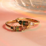 Flat lay of 0.37ct Watermelon Tourmaline, Sapphire, Tourmaline and Diamond Kaleidoscope Ring and 0.44ct Watermelon Tourmaline, Sapphire, Tourmaline and Diamond Kaleidoscope Ring