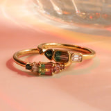 Flat lay of 0.37ct Watermelon Tourmaline, Sapphire, Tourmaline and Diamond Kaleidoscope Ring and 0.44ct Watermelon Tourmaline, Sapphire, Tourmaline and Diamond Kaleidoscope Ring