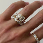 The Inez Toi et Moi Engagement Ring on hand, white background