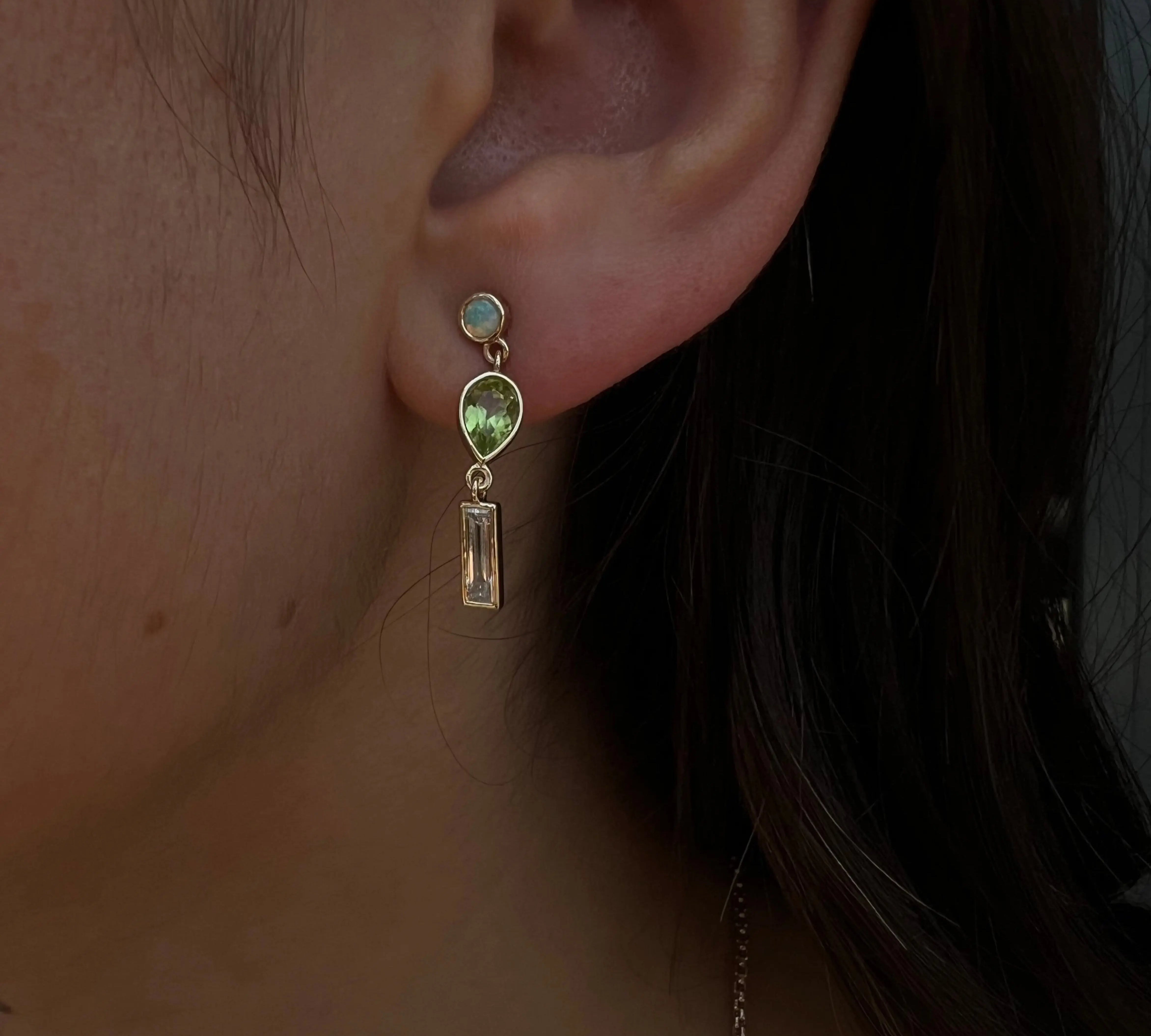 0.35tcw Diamond, 0.94tcw Peridot and Opal Earrings [in ear]