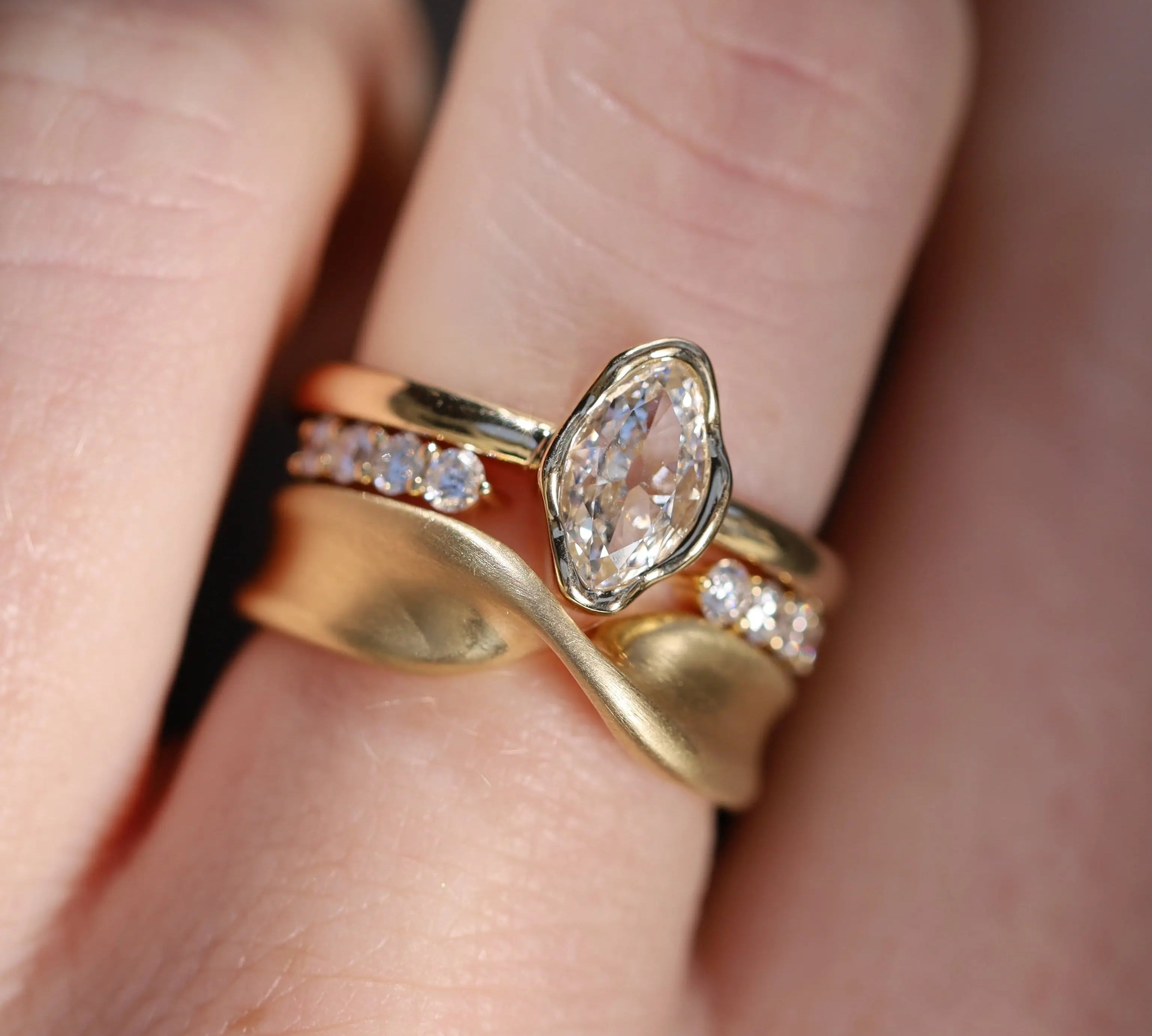 0.57ct Marquise Diamond Abstract Bezel Ring on hand