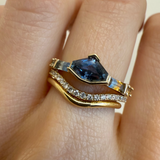 0.93ct Montana Sapphire Shield Linear Band close up on woman's hand