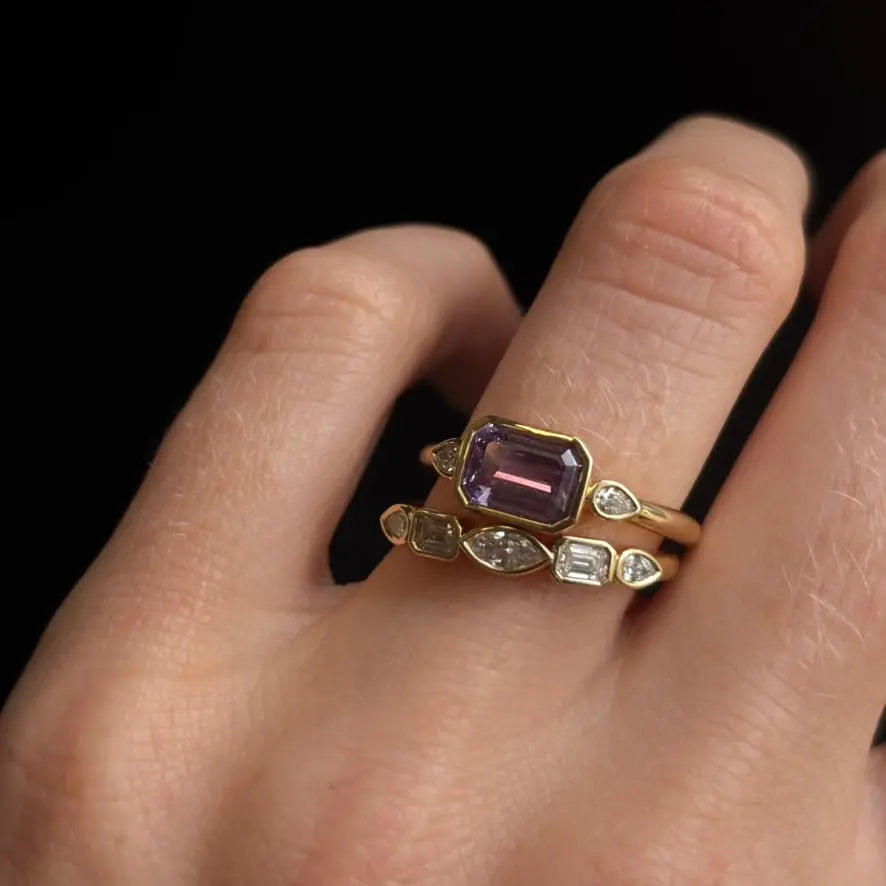 Close up of 1.59ct Sapphire and Diamond Ring with Tracer Band on hand