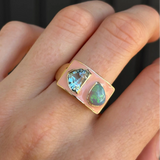Gold ring with melon enamel and Aqua and Opal gemstones