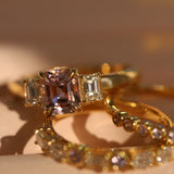Flat lay of 1.76ct Pink Sapphire and Diamond Ring with Cosmic Light & Third Band