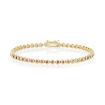 1.86tcw Orangish / Red Sapphire Tennis Bracelet [flat lay]