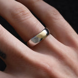 Close up of two-tone men's band on hand