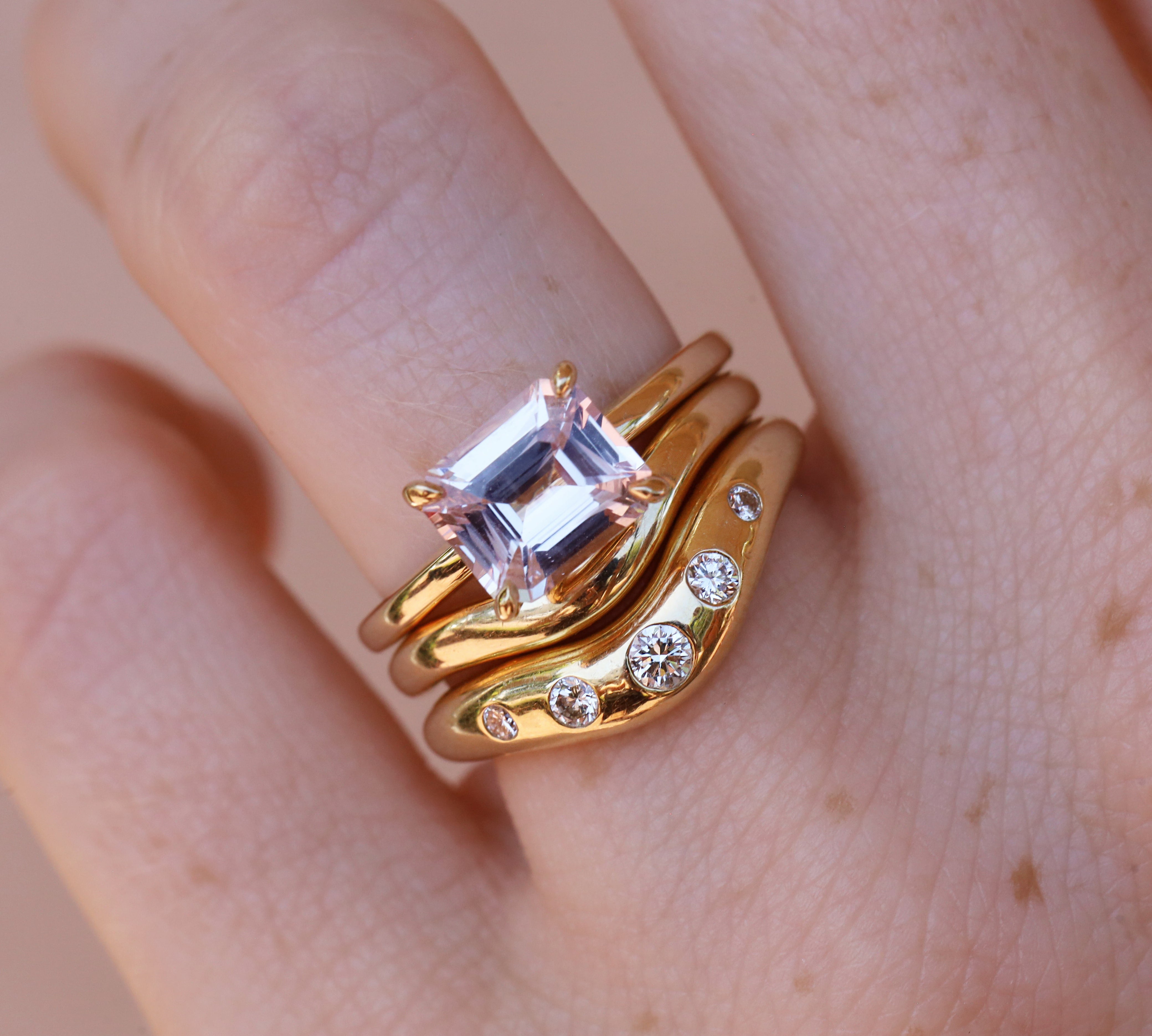 2.33ct Blushy Lavendar Sapphire EW Annette ring stacked with gold bands