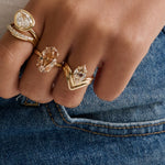 2.76ct Old Mine Marquise on ring finger with two other diamond rings on hand