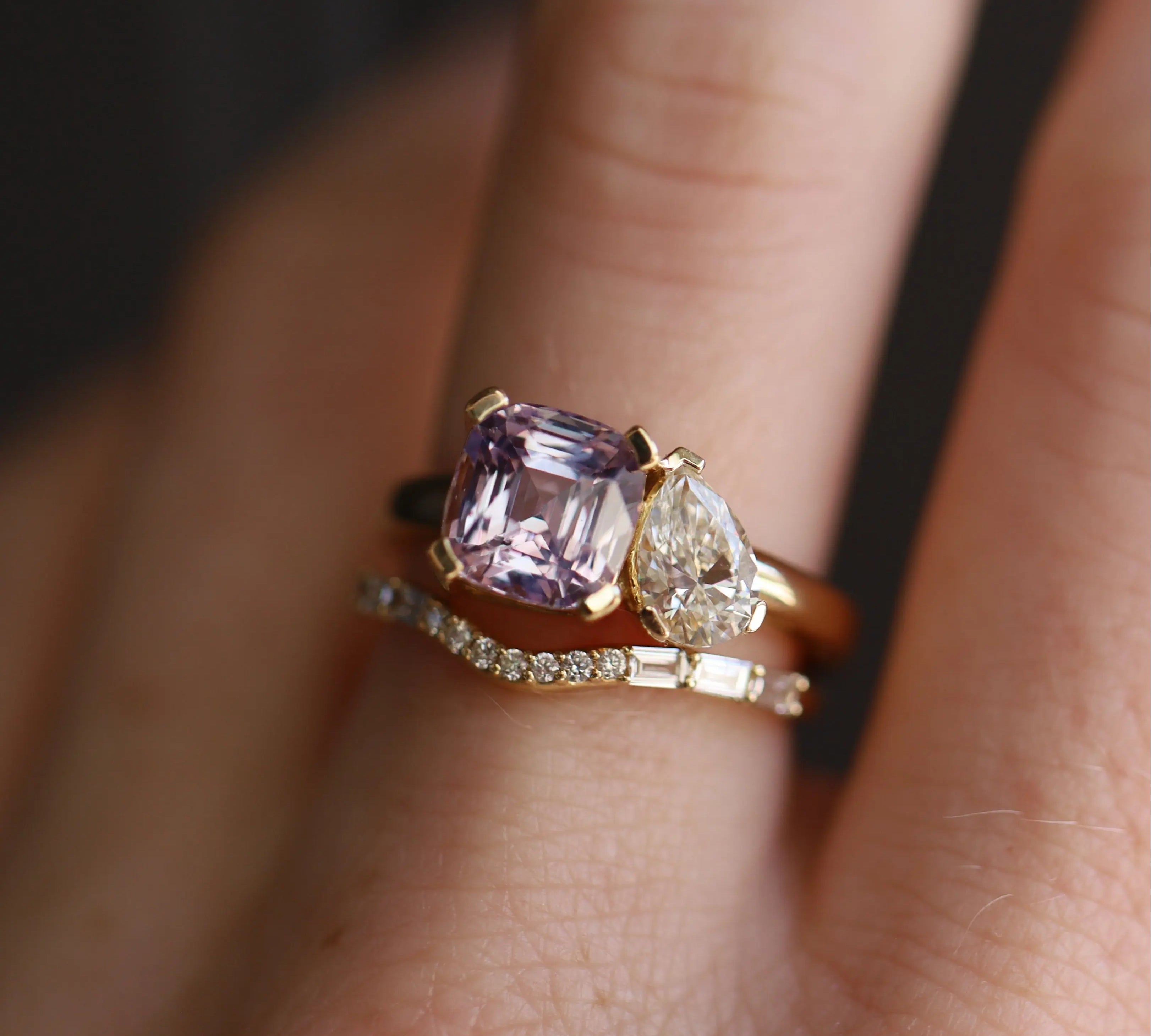 Close up of 3.06ct Sapphire and 0.71ct Diamond Toi et Moi styled on woman's hand