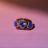 Berry enamel ring in 14k yellow gold set with a tanzanite heart and two freeform boulder opals