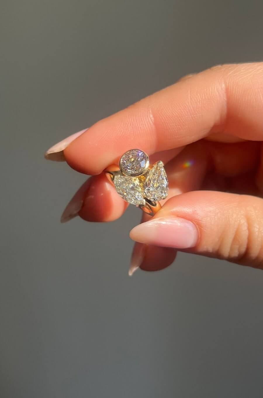 custom white diamond cluster ring with 3 stones