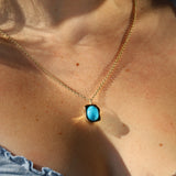 5.69ct Abstract Turquoise Bezel Pendant [on neck]