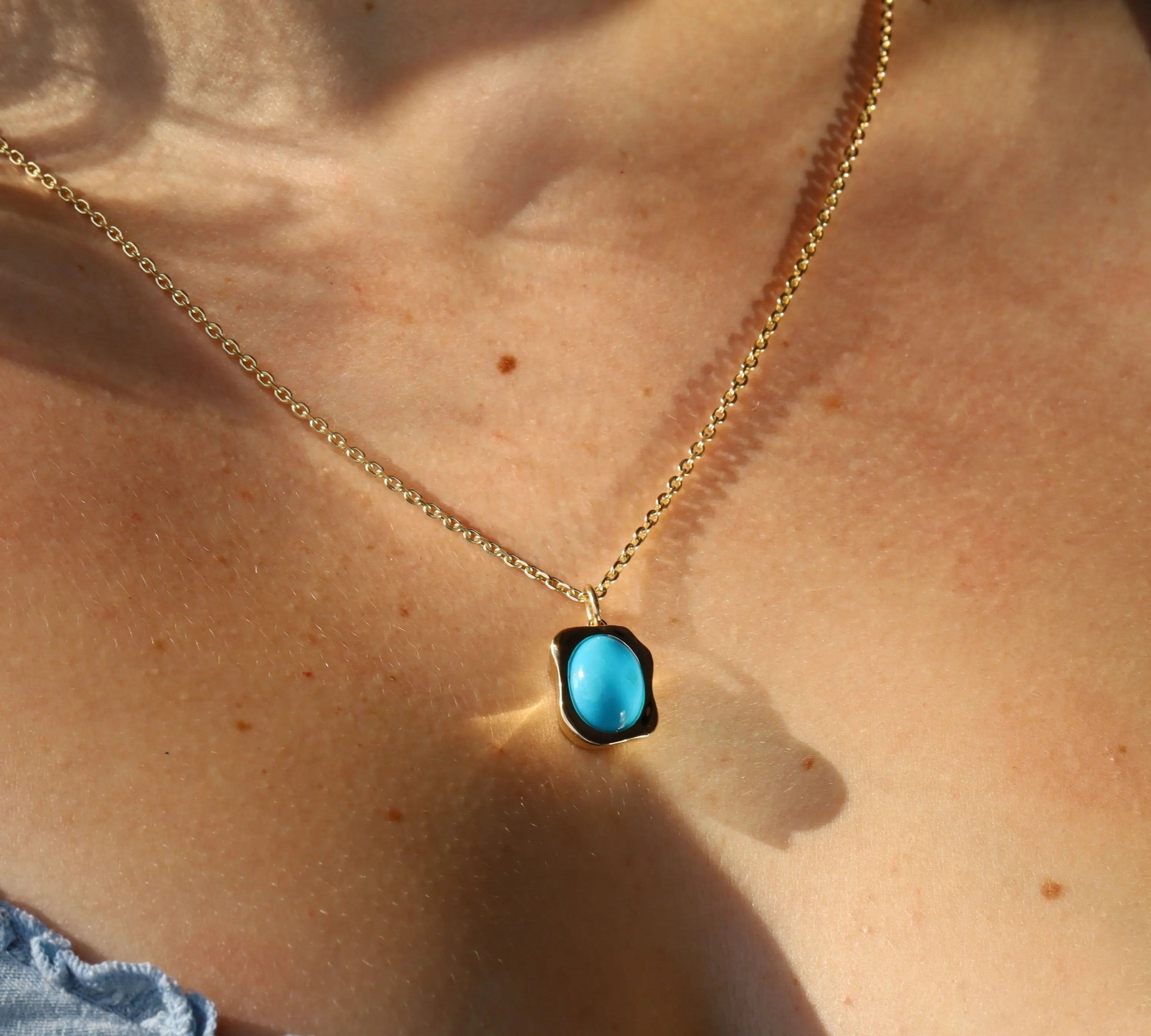 5.69ct Abstract Turquoise Bezel Pendant [on neck]