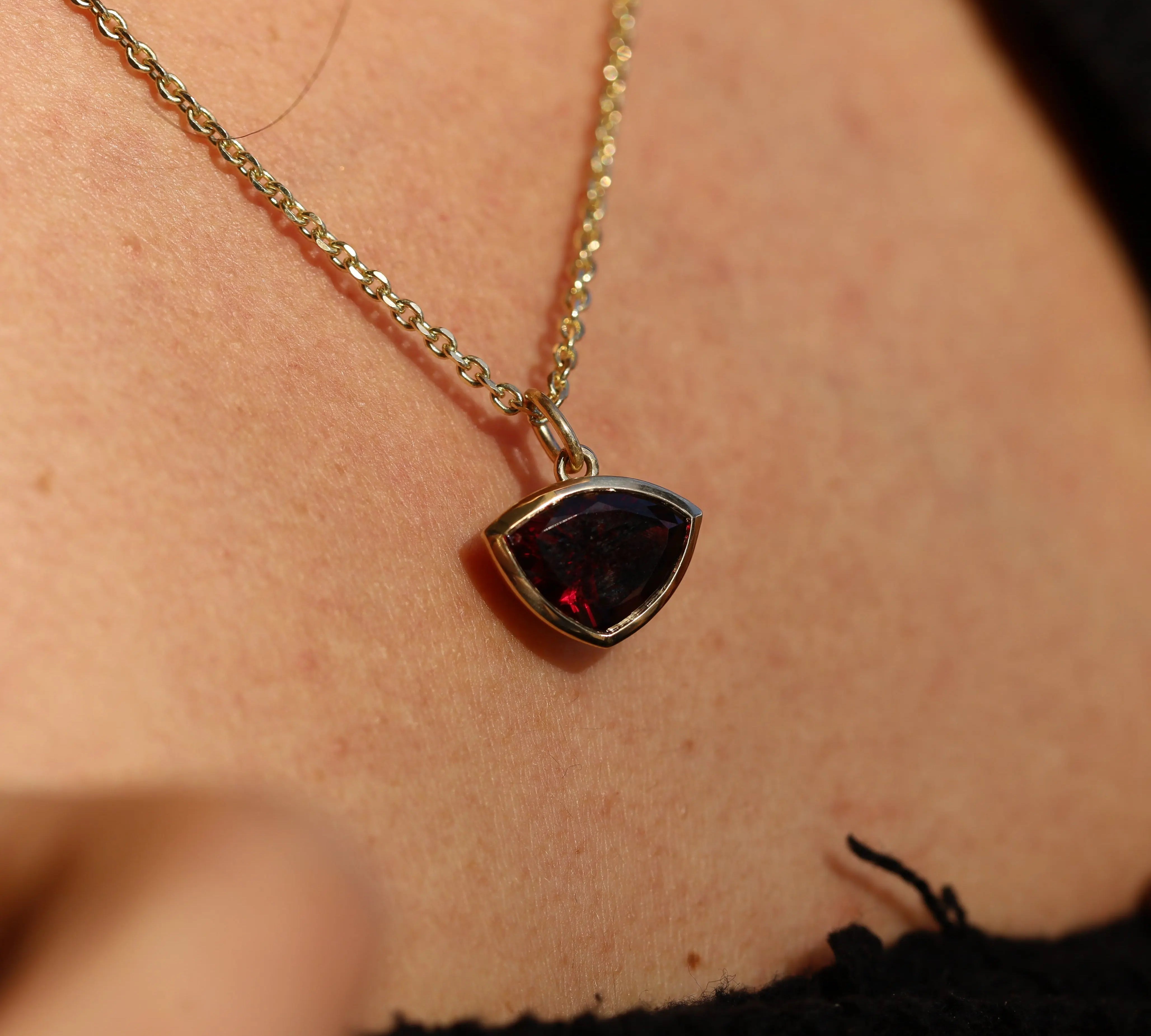 6.13ct Raja Garnet Pendant [on neck]
