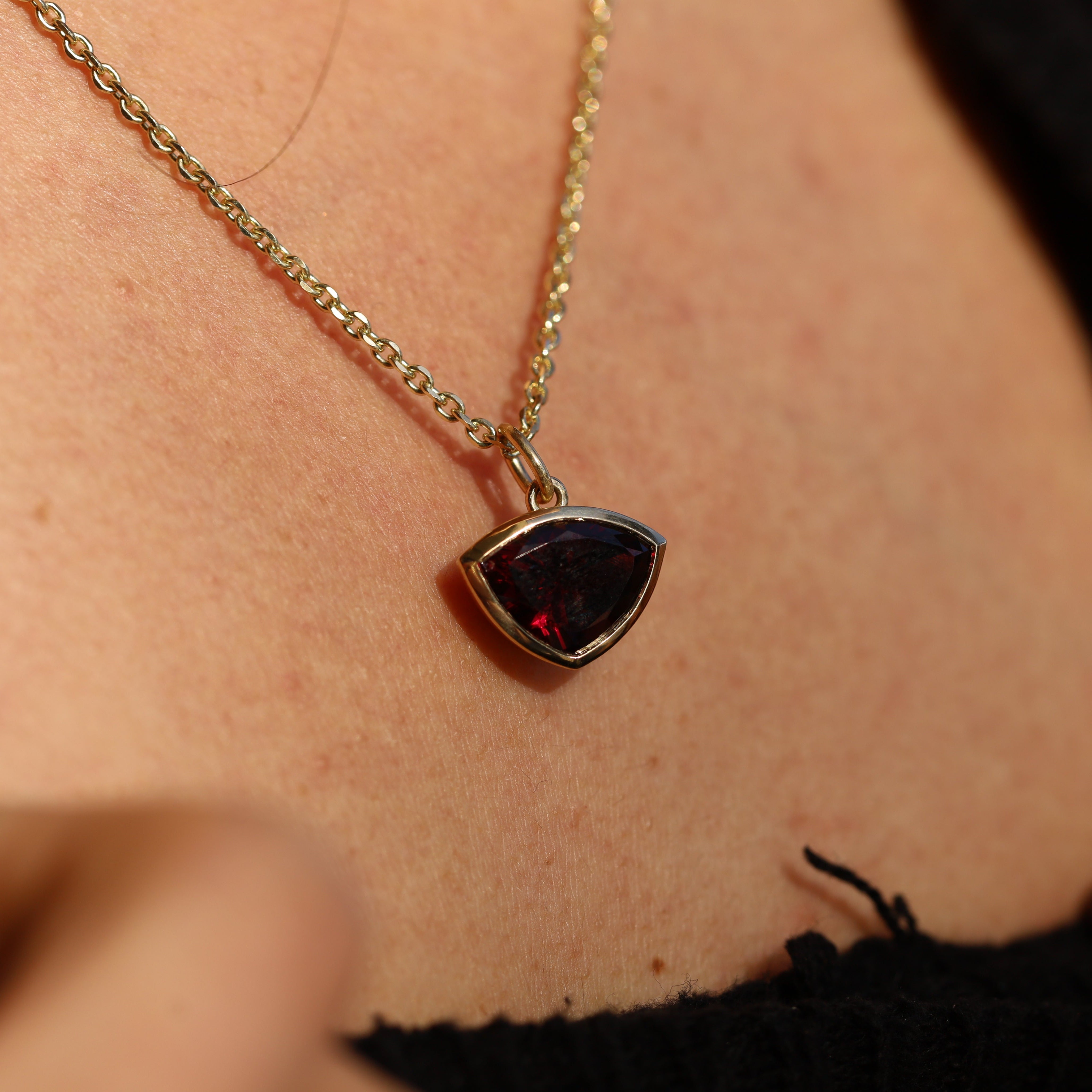 6.13ct Raja Garnet Pendant [on neck]