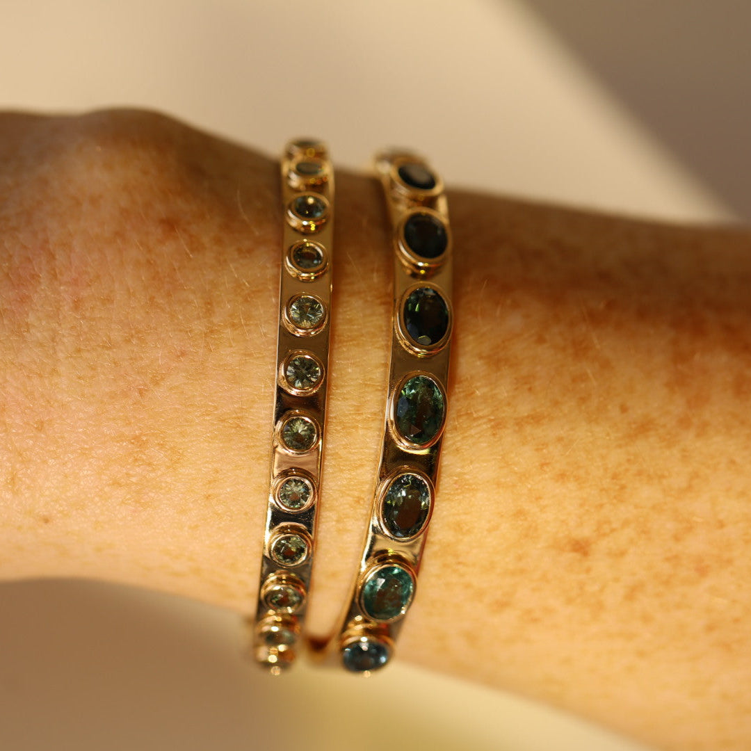 Close up of 2.24tcw Green Sapphire Everyday Cuff on wrist