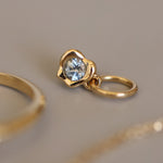 Abstract Bezel Charm flat lay