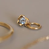 Abstract Bezel Charm flat lay