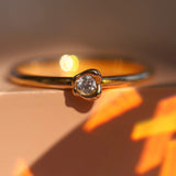 Diamond Abstract Bezel Sweet Pea Ring flat lay