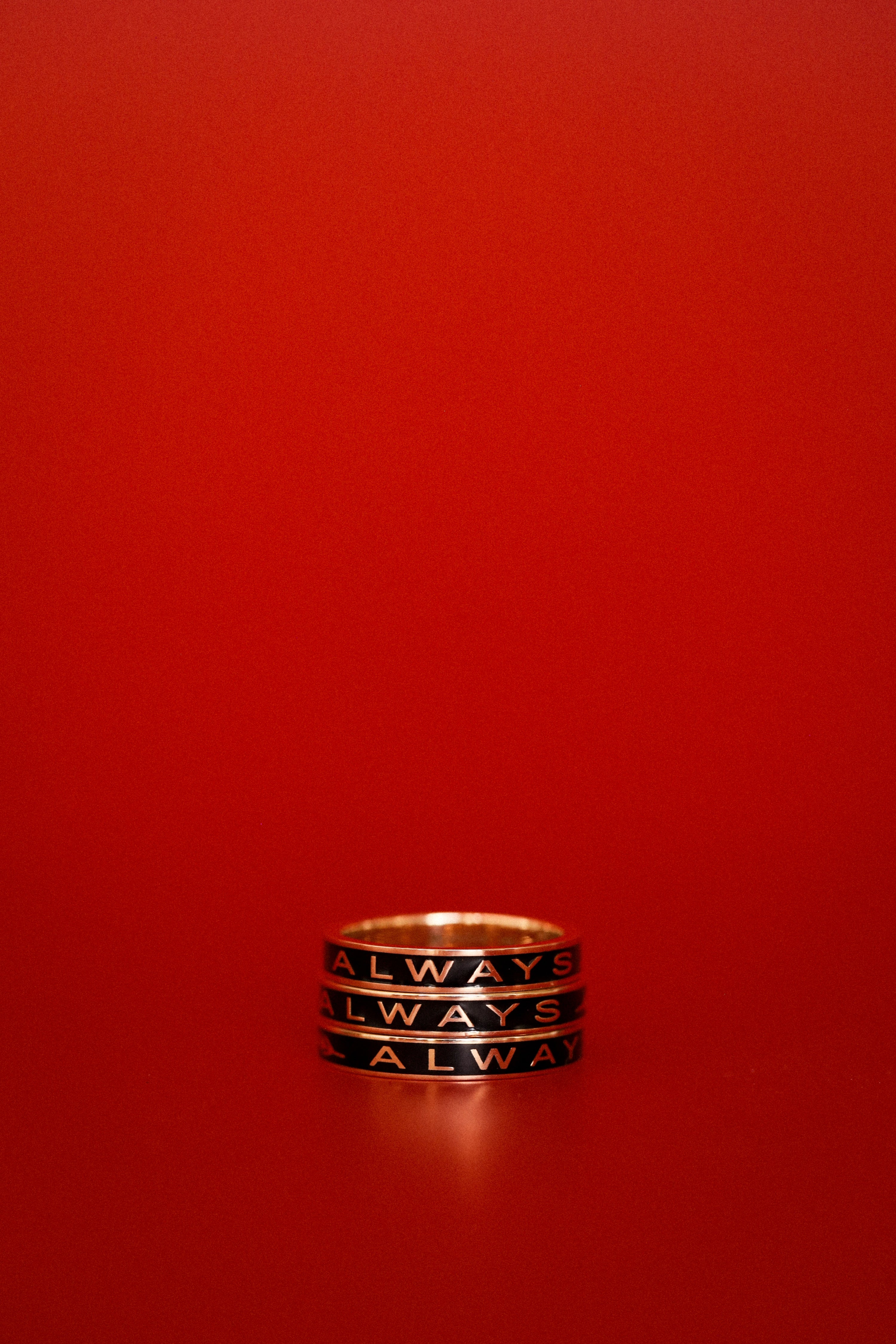 Three rings with 'ALWAYS' text on a red background