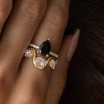 Close up of model with hand resting on her face, featuring Arno Serpentine Band
