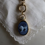 Leo Zodiac black agate carving pendant in 14k yellow gold with a floating diamond