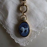 Leo Zodiac black agate carving pendant in 14k yellow gold with a floating diamond