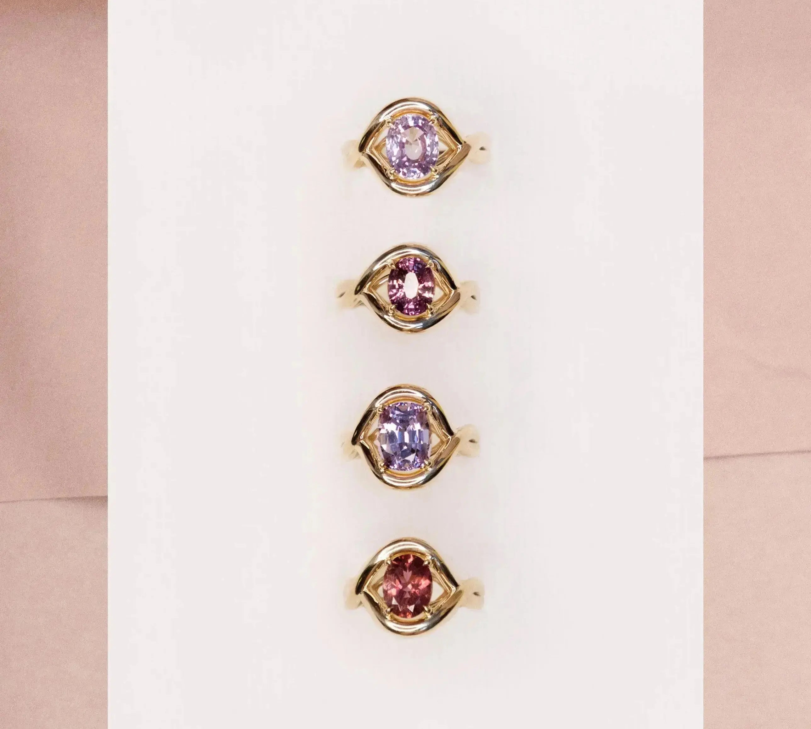 Flat lay of Marrow x Sammi colored gemstone Florence rings