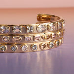 3.30tcw Fancy Tanzanite Cuff + 2.02tcw Tanzanite Cuff + 6.41tcw Fancy Tanzanite Cuff flat lay