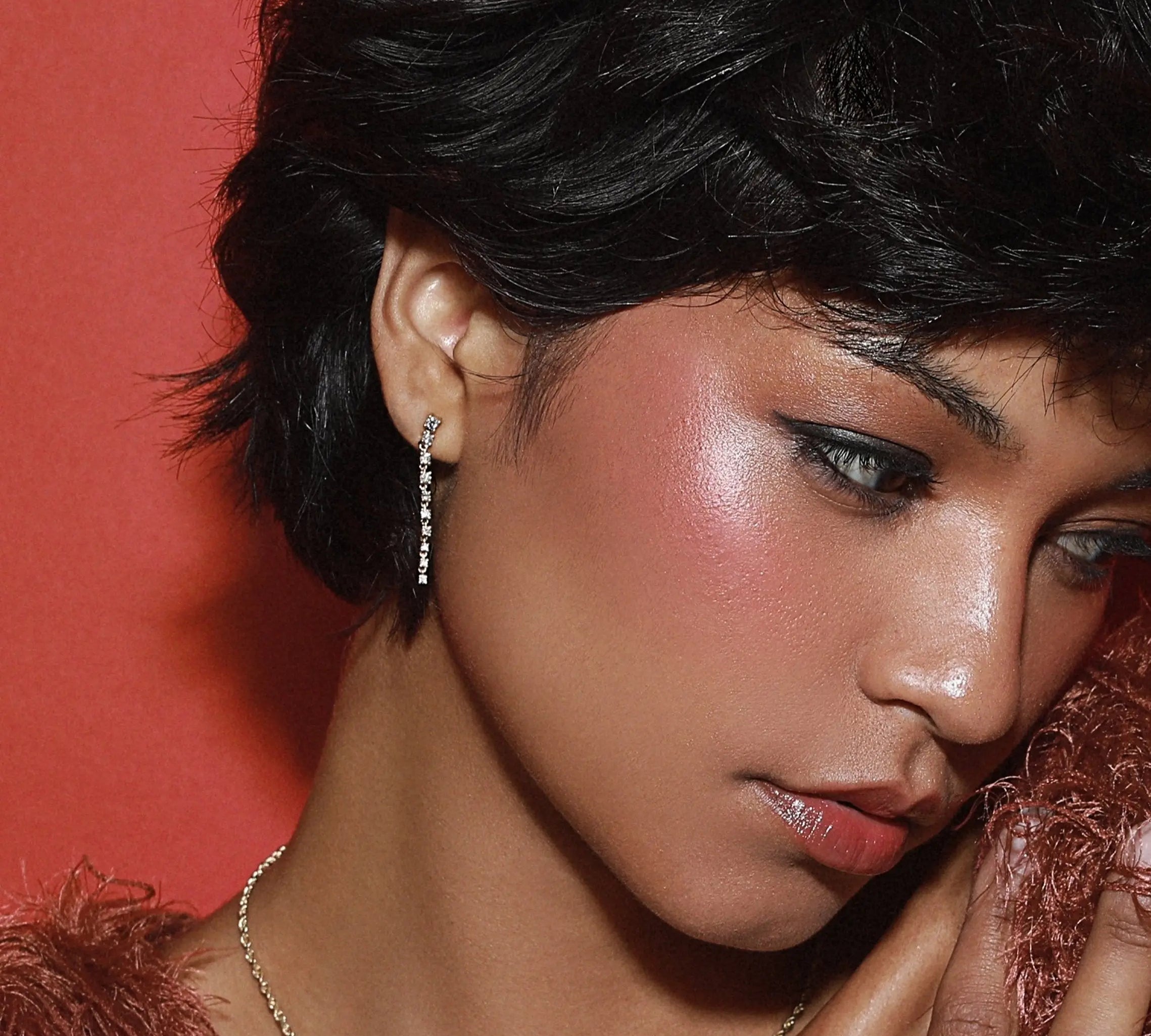 Close up of woman wearing Marrow Fine Diamond Cascading Earrings