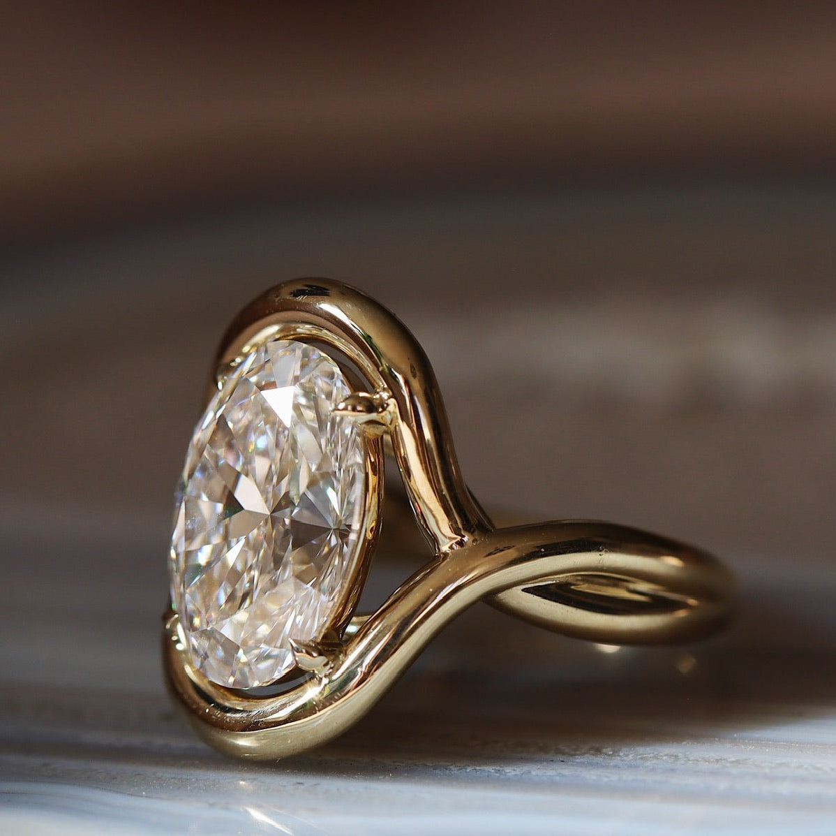 Marrow x Sammi Florence Engagement Ring flat lay,side view