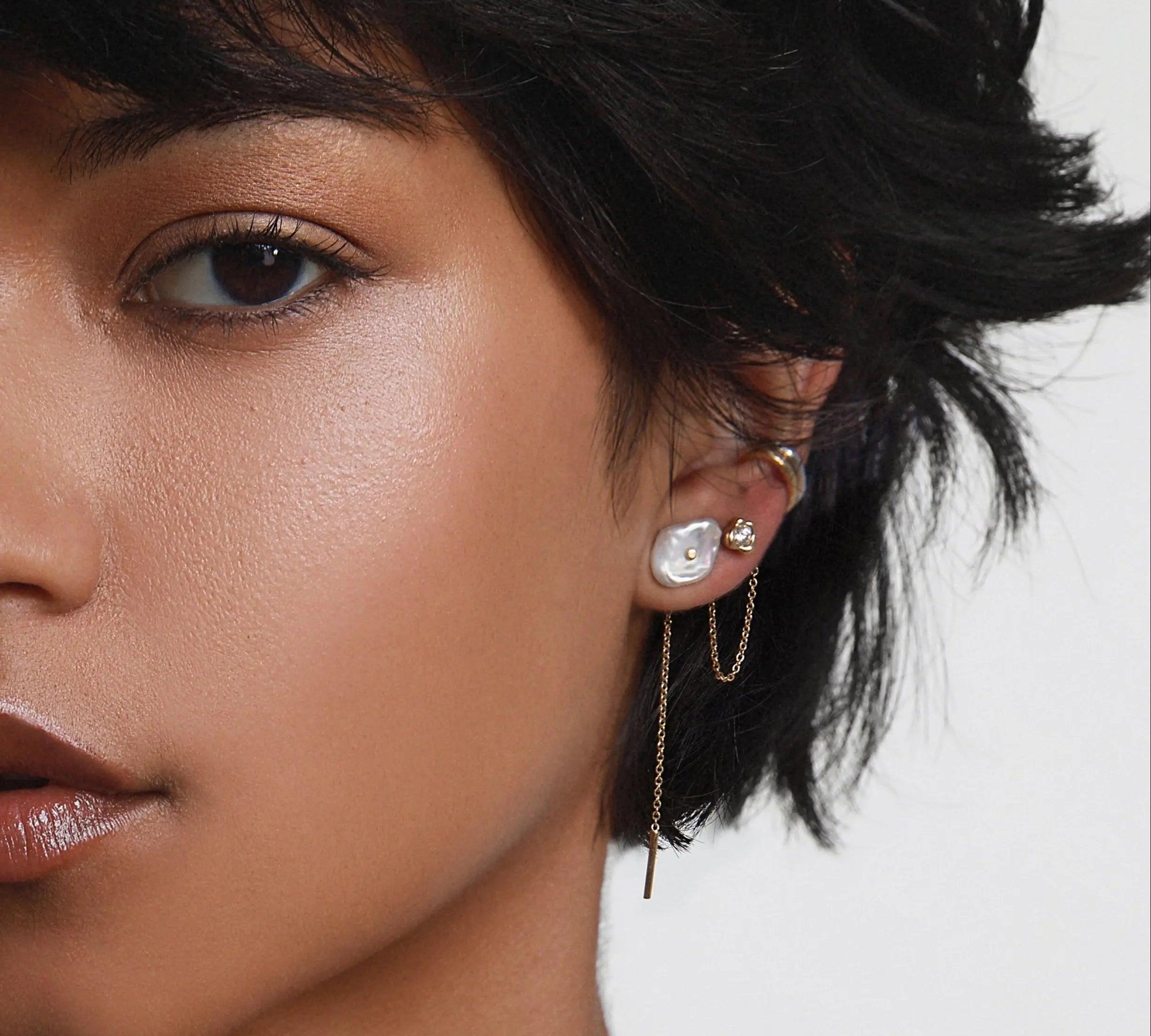 Close up of Organic Pearl Chain Studs on ear