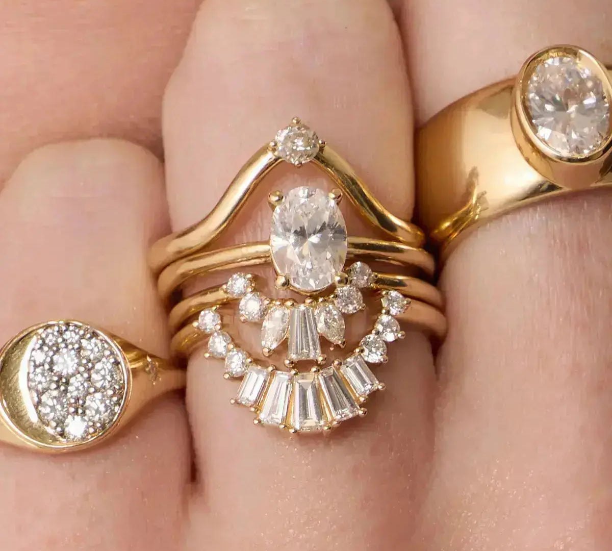 The Helene Oval Solitaire Engagement Ring close up on hand