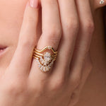 The Helene Oval Solitaire Engagement Ring close up on hand