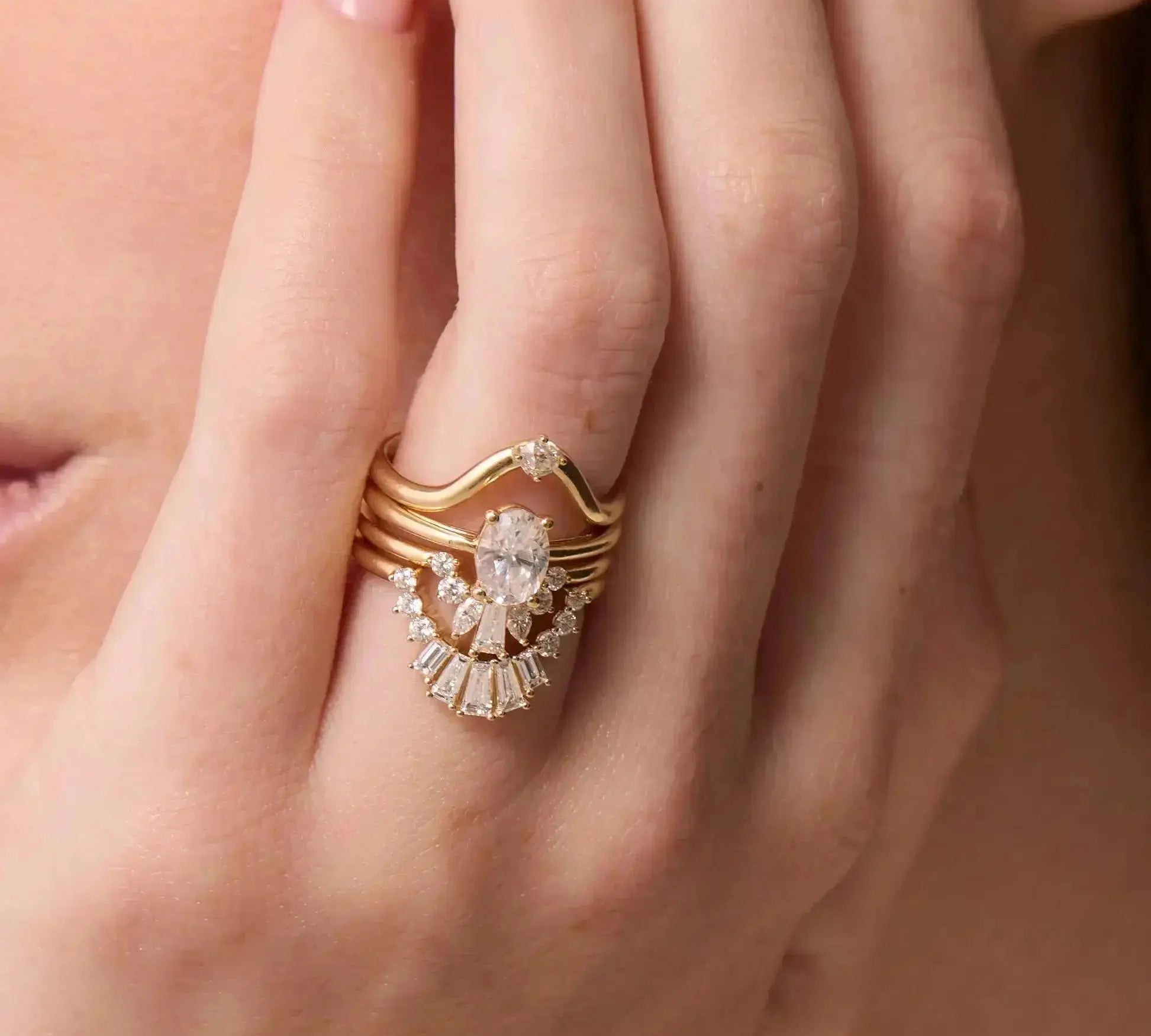 The Helene Oval Solitaire Engagement Ring close up on hand